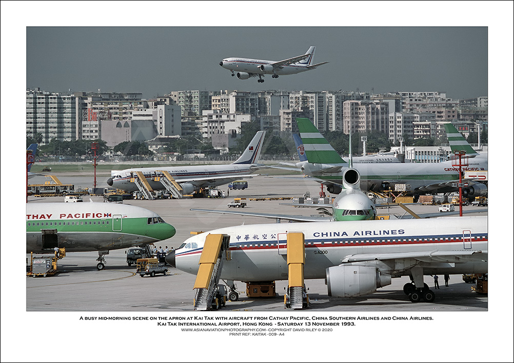KAI TAK - A busy mid-morning scene on the apron at Kai Tak - 009